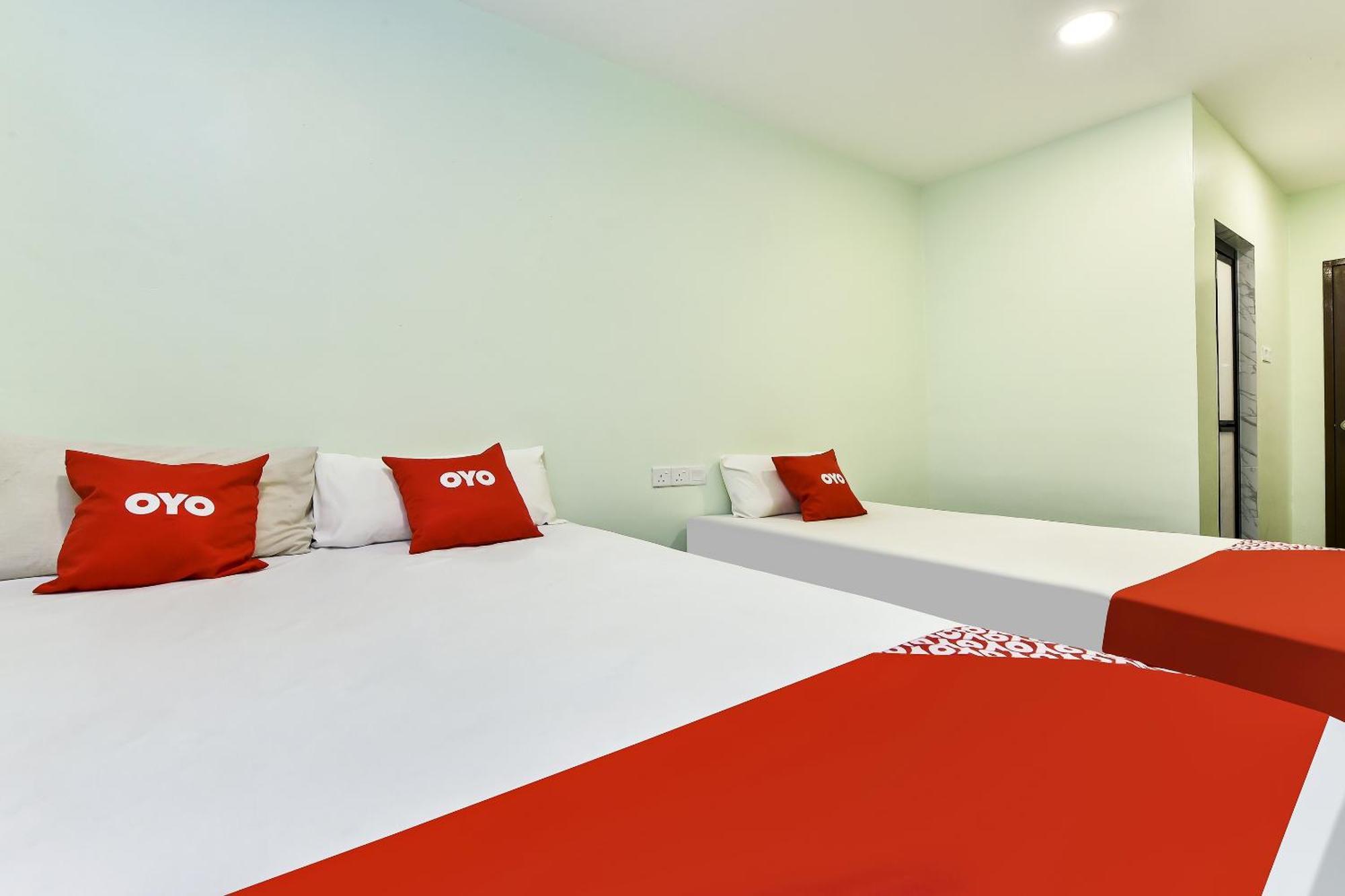 Oyo 90445 Th Hotel Bahau Esterno foto